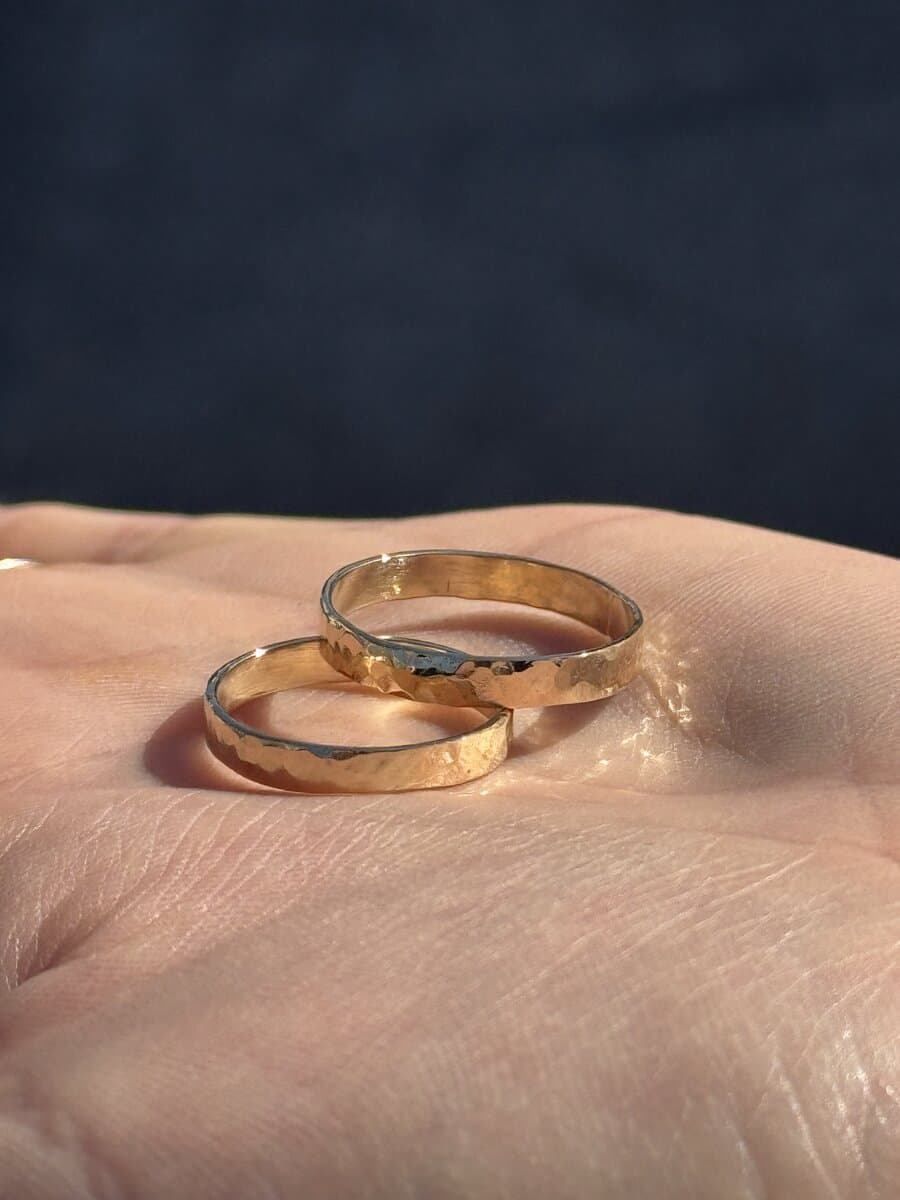 Hammered gold matching wedding bands by Pacific Jewel
