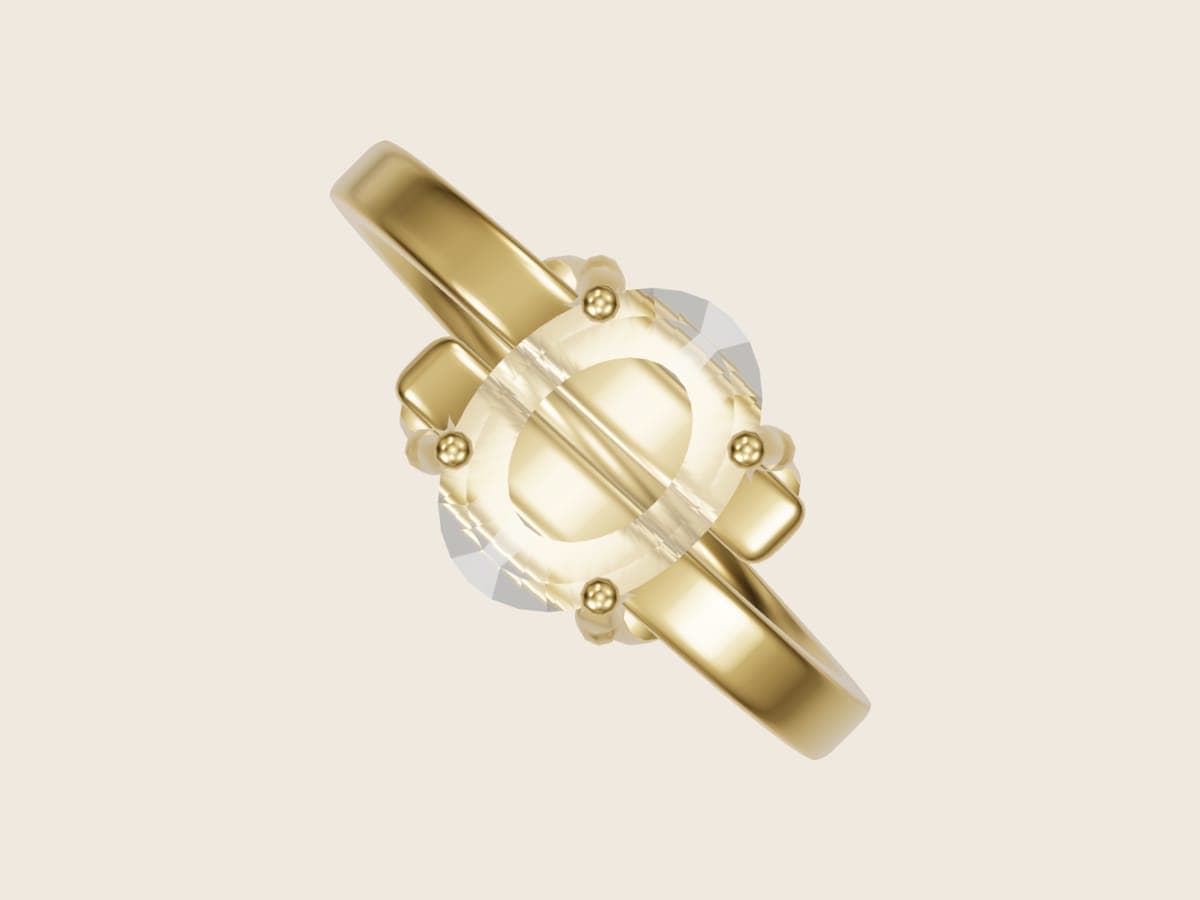 3D render from above of an oval diamond held between the two arms of a 14k yellow gold bypass shank, from the Pacific Jewel Design Studio